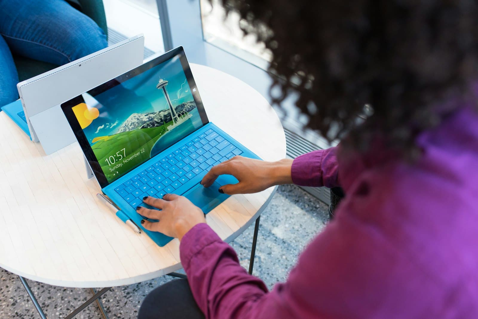 Professional coordinating project work on a laptop